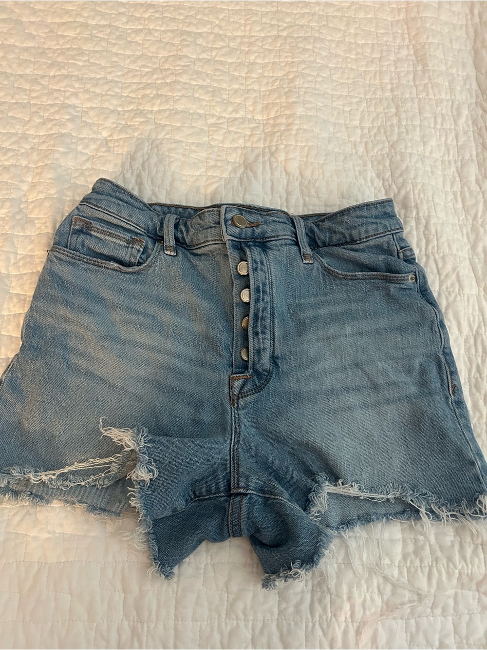 Good American Light Blue High-Rise Distressed Button-Fly Jean Shorts
